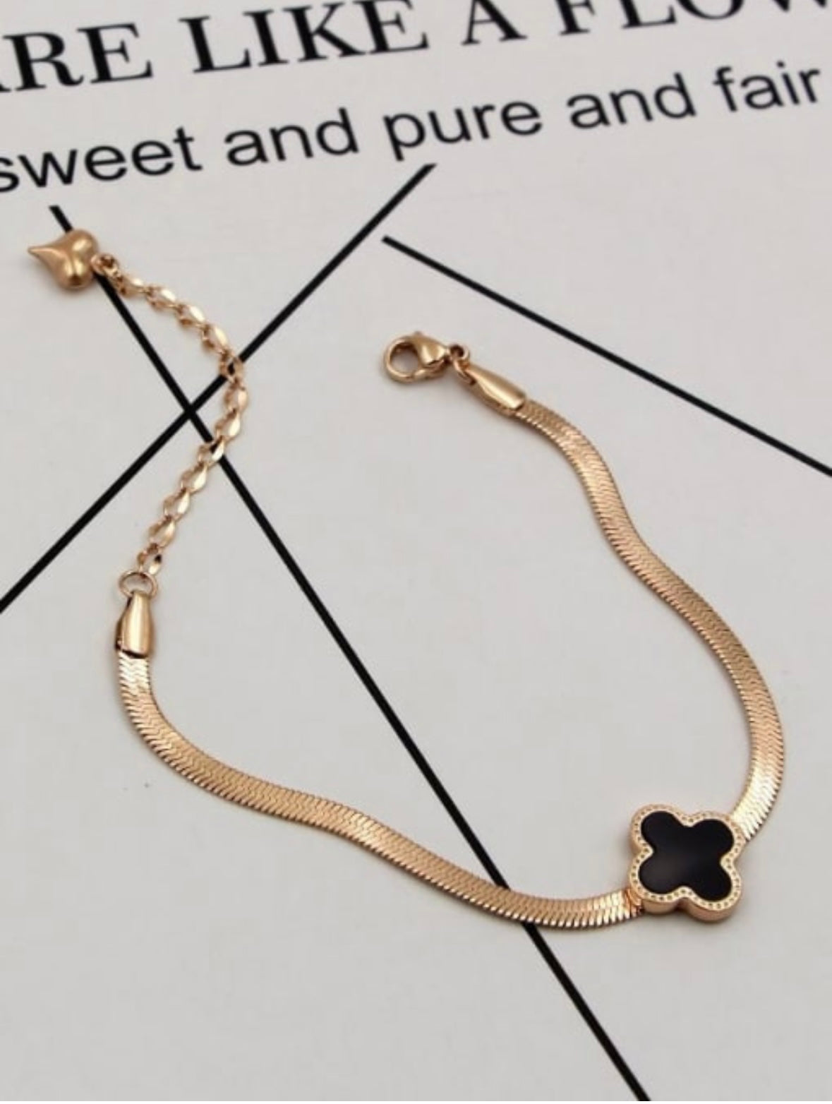 BLACK DESIGN BRACELET.